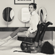 Image for article titled Today In WTF: Russian Socialite Poses On Chair Made Of A Black Woman